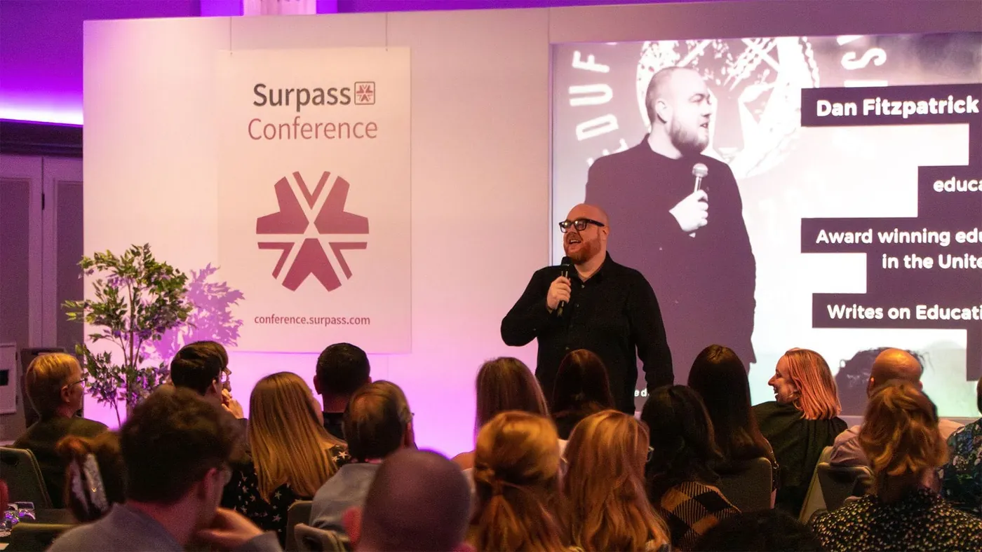 Dan Fitzpatrick speaking to an audience at the Surpass Conference